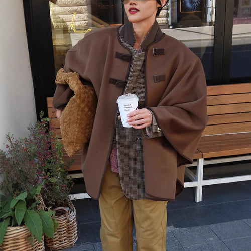 Damen Oversize Cape Mantel aus Wollmix mit hohem Stehkragen und Lederlaschen Shop Nory