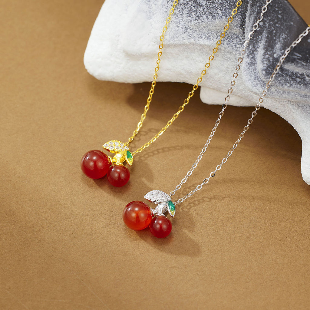 Damen Halskette mit kunstvoll gestaltetem Kirschanhänger und funkelnden Zirkonia Shop Nory
