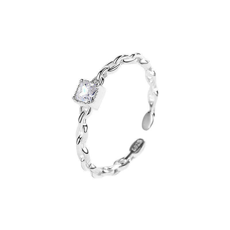 Damen eleganter Ring mit hochwertiger Zirkonia-Fassung und filigranem Kettendesign Shop Nory