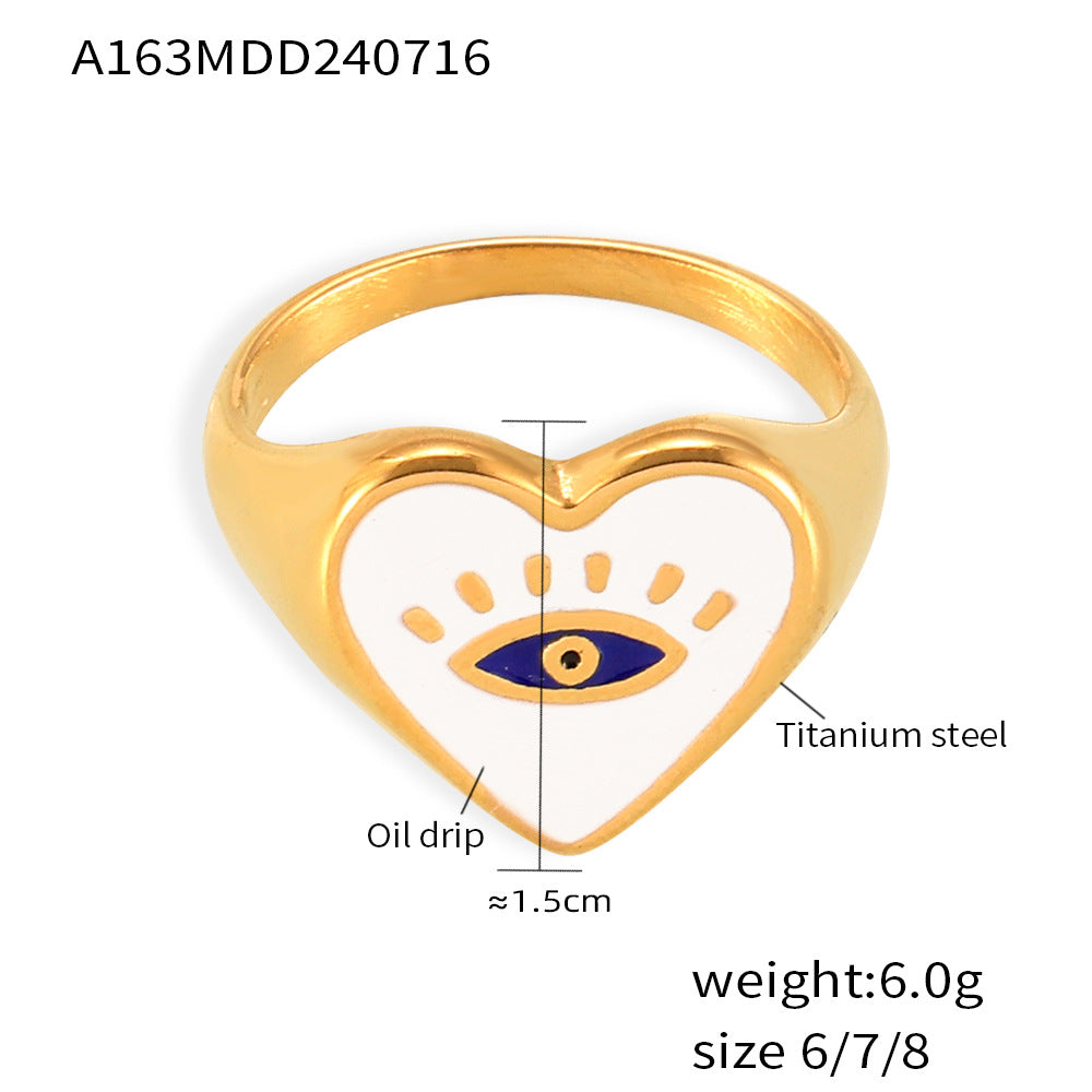 Damenring mit herzförmigem Design und Eye-Emblemen Shop Nory