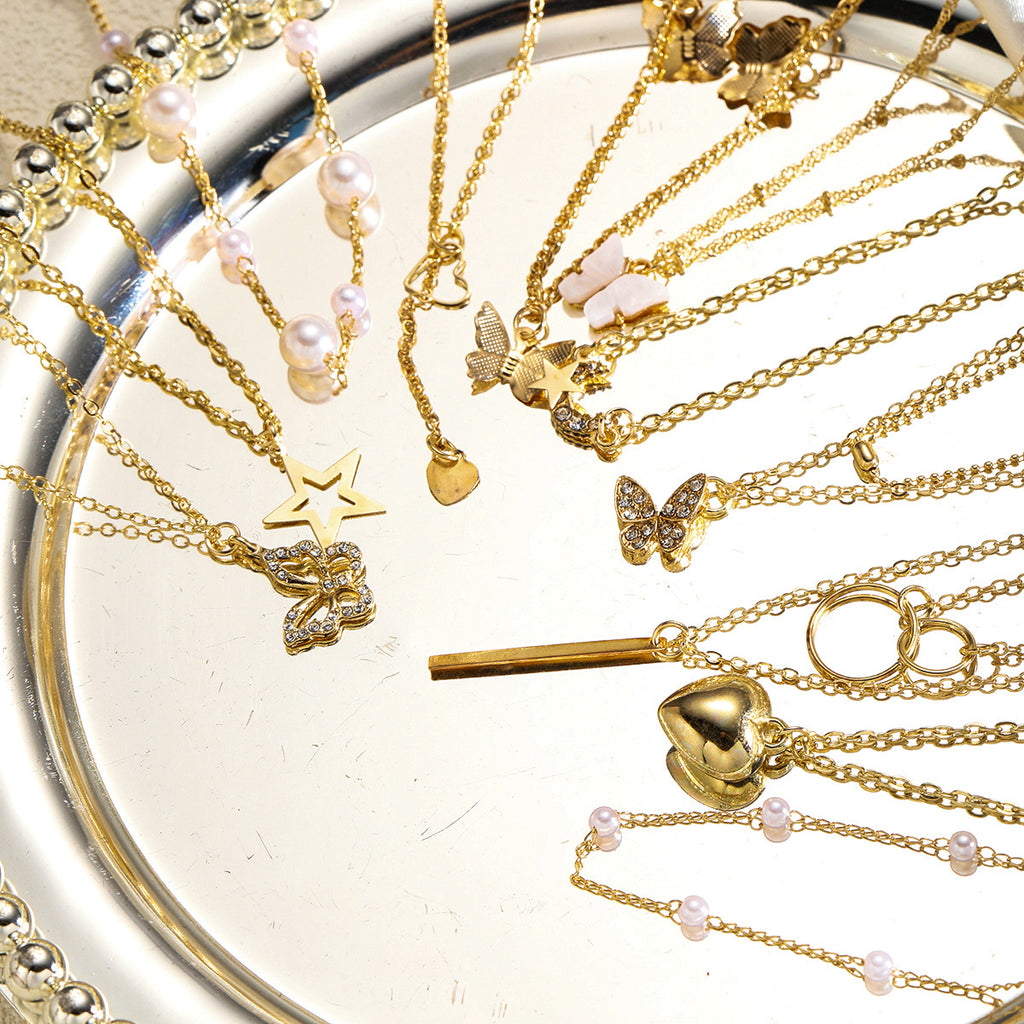 Damen Halsketten-Set mit einzigartigen Anhängern und filigranen Details Shop Nory