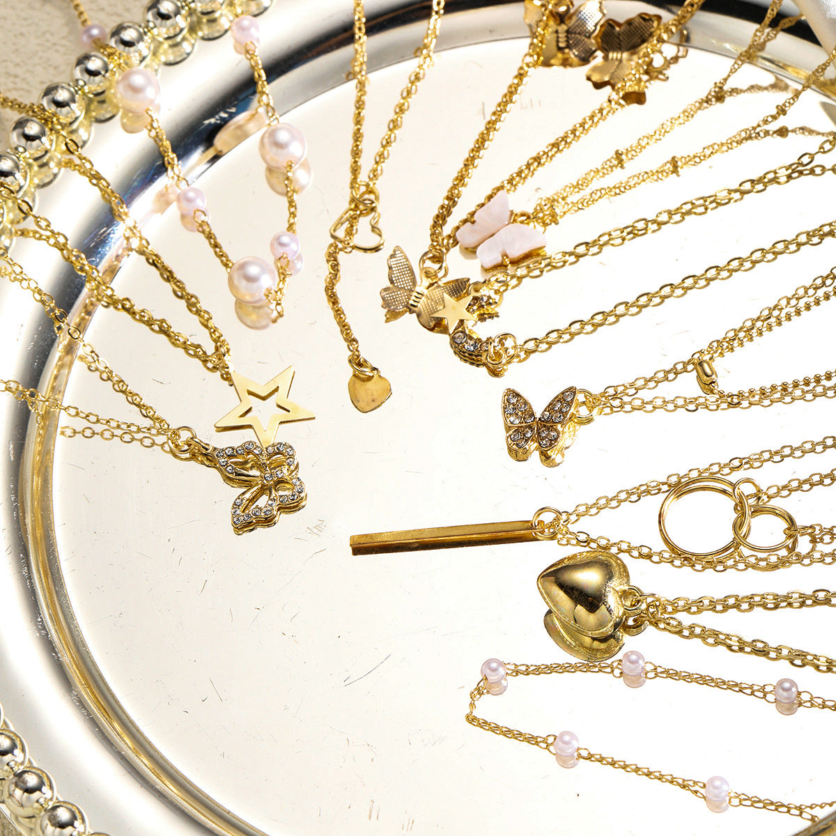 Damen Halsketten-Set mit einzigartigen Anhängern und filigranen Details Shop Nory
