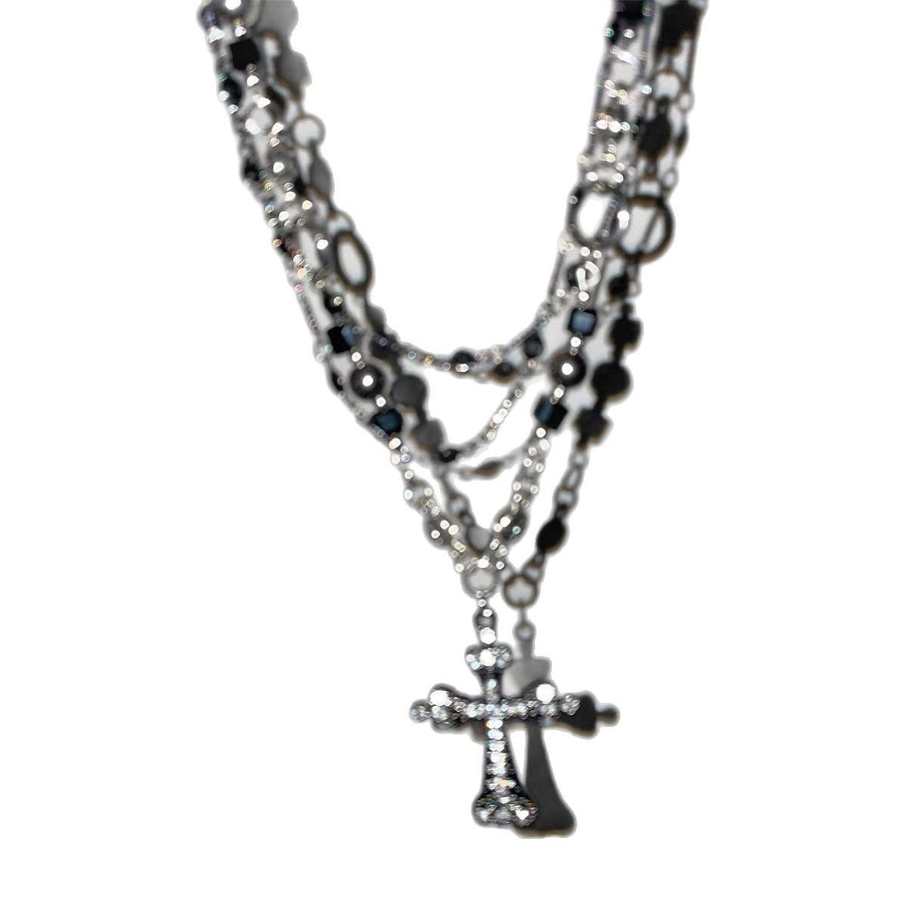 Damen mehrlagige Kette mit funkelndem Kreuzanhänger und eleganten Gliederkettendetails Shop Nory