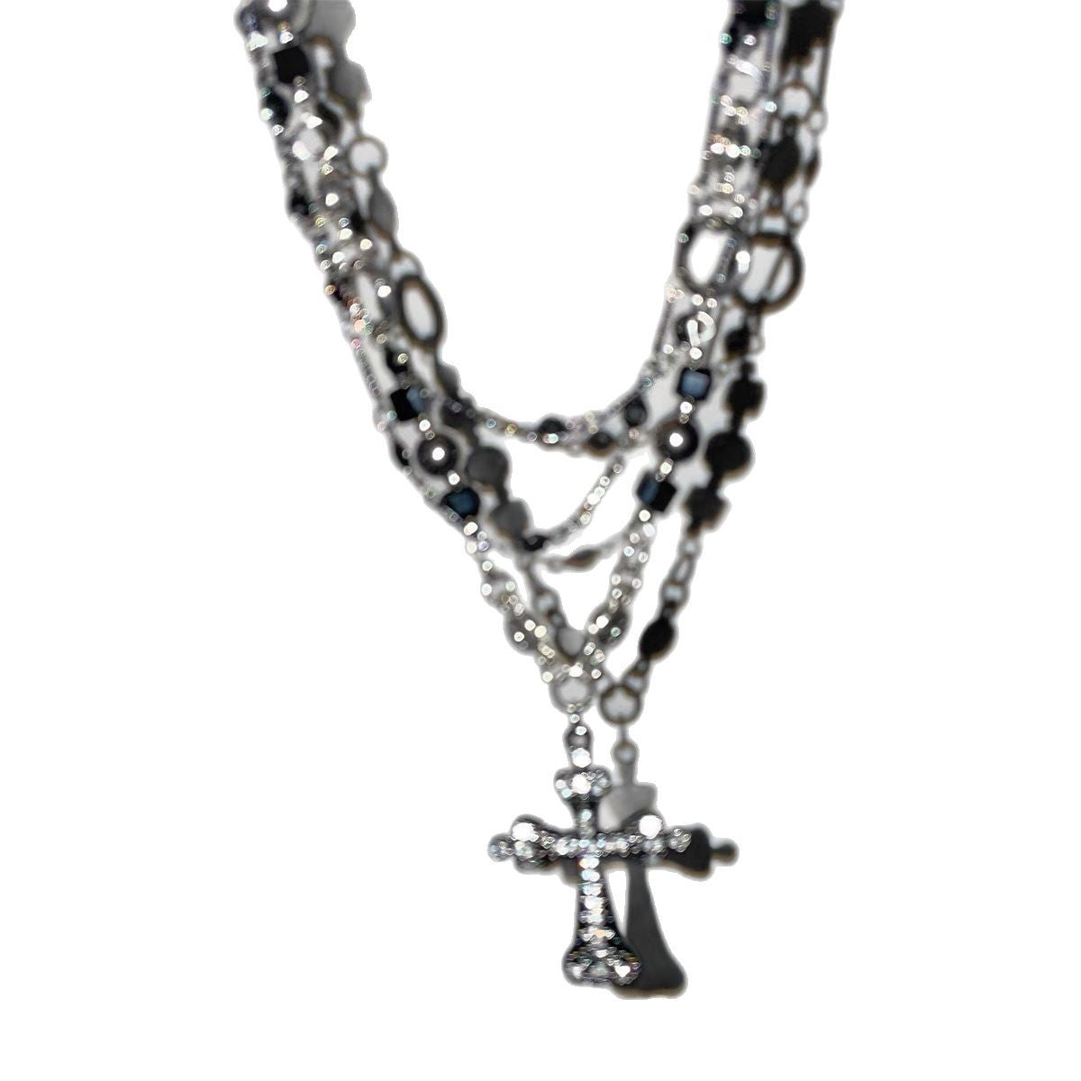 Damen mehrlagige Kette mit funkelndem Kreuzanhänger und eleganten Gliederkettendetails Shop Nory