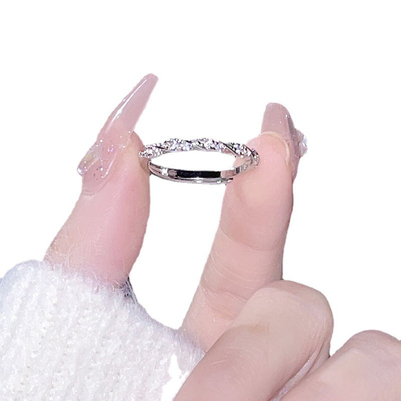 Damen eleganter Wellenring mit funkelnden Zirkonia-Steinen Shop Nory