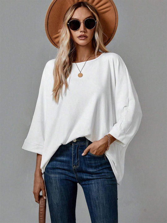 Damen Oversize Tunika‑Bluse mit U‑Boot‑Ausschnitt und dreiviertelärmeln Shop Nory
