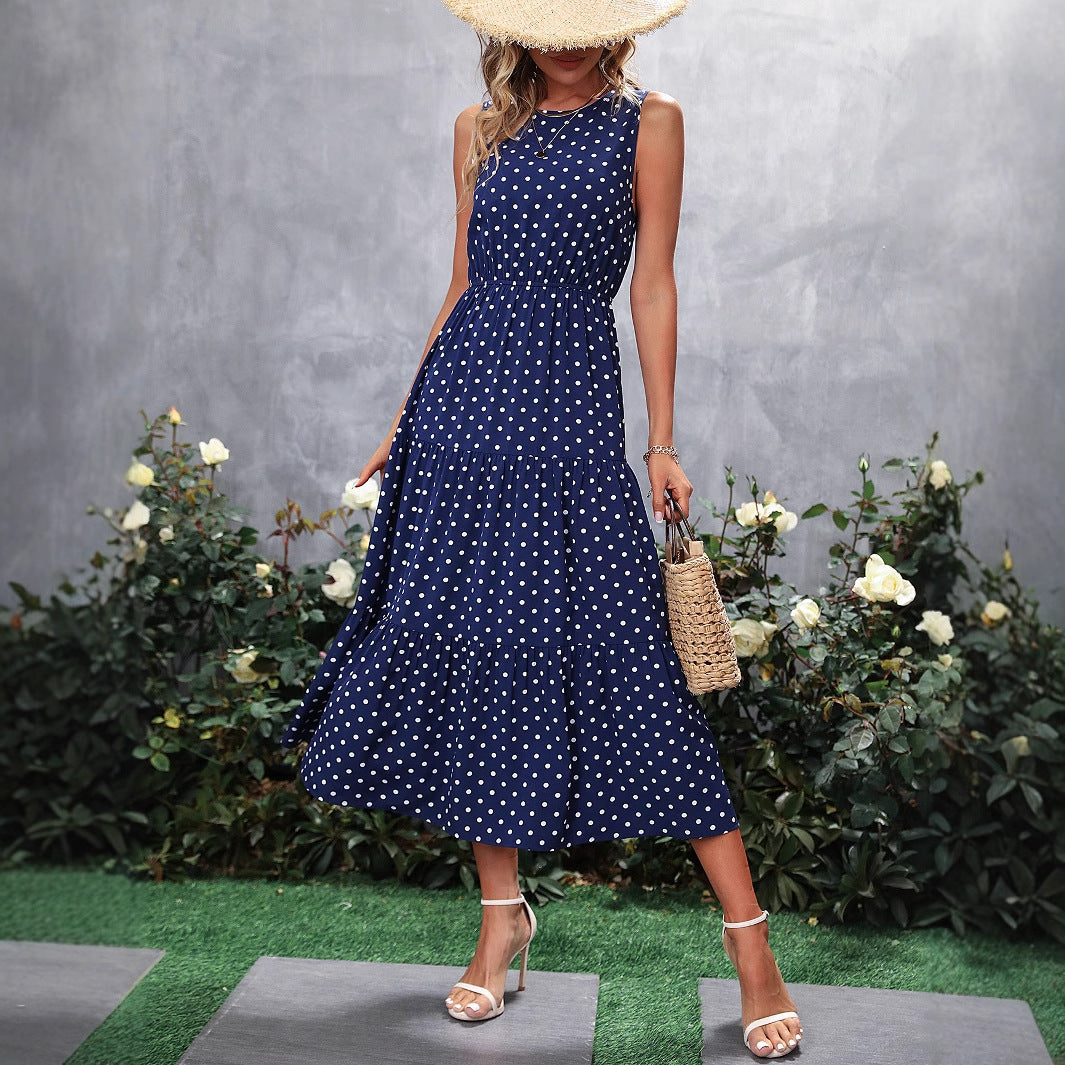 Damen Maxikleid mit Punkten und voluminösem Saum Shopnory
