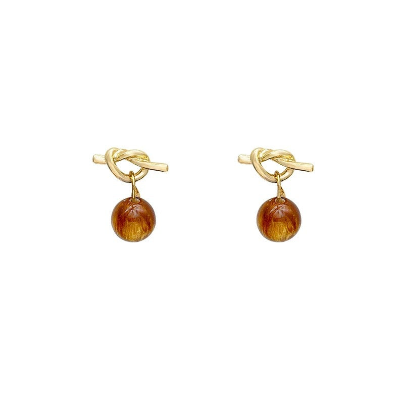 Damen Ohrringe mit einzigartigem Knoten-Design und kunstvollen Kugeln Shop Nory