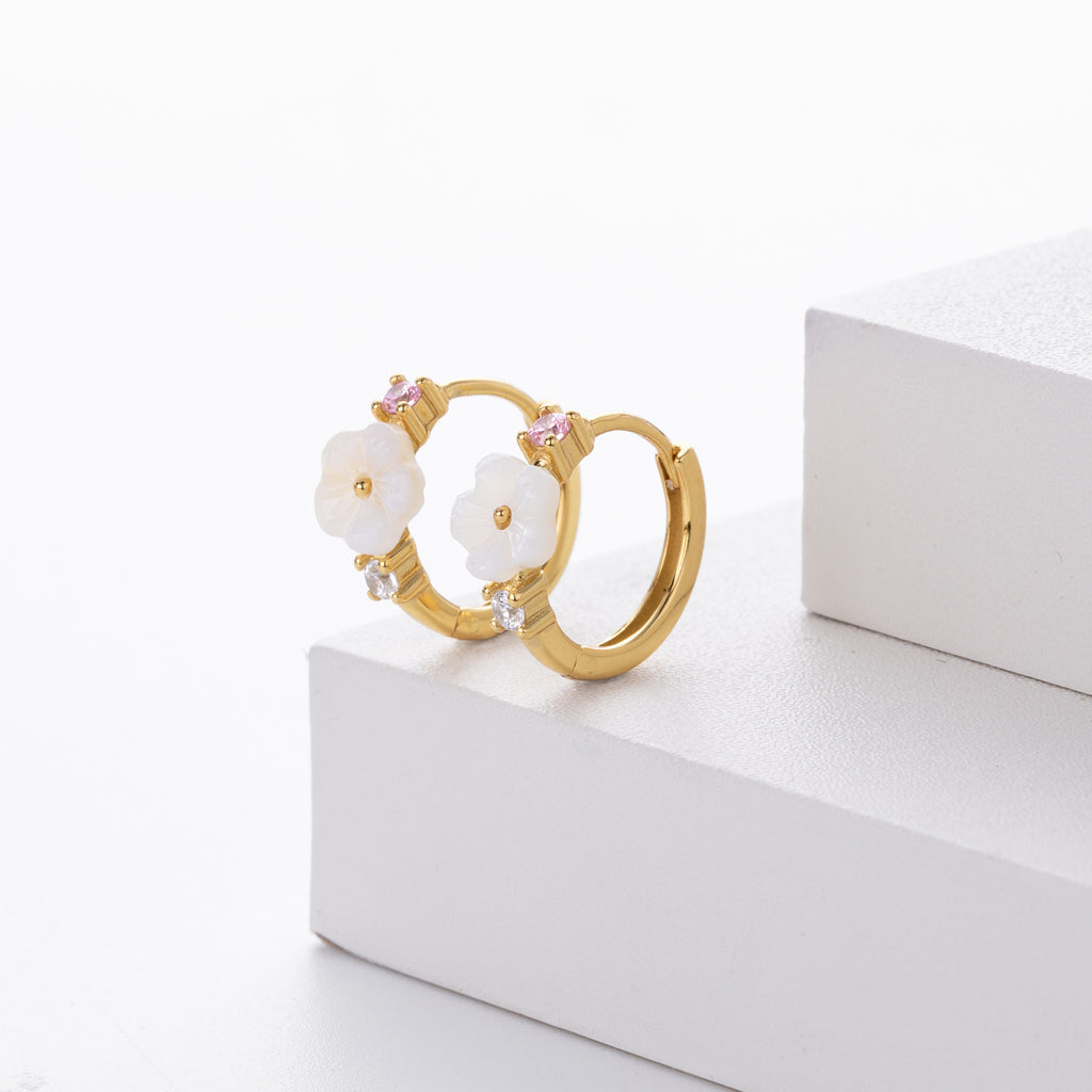 Damen Ohrhänger mit blütenförmigem Design und funkelnden Zirkon-Akzenten Shop Nory