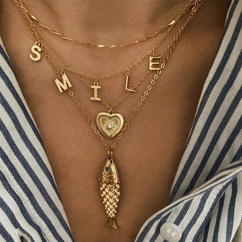Damen Halskette mit stilvollem Fischanhänger aus hypoallergenem Edelstahl Shop Nory