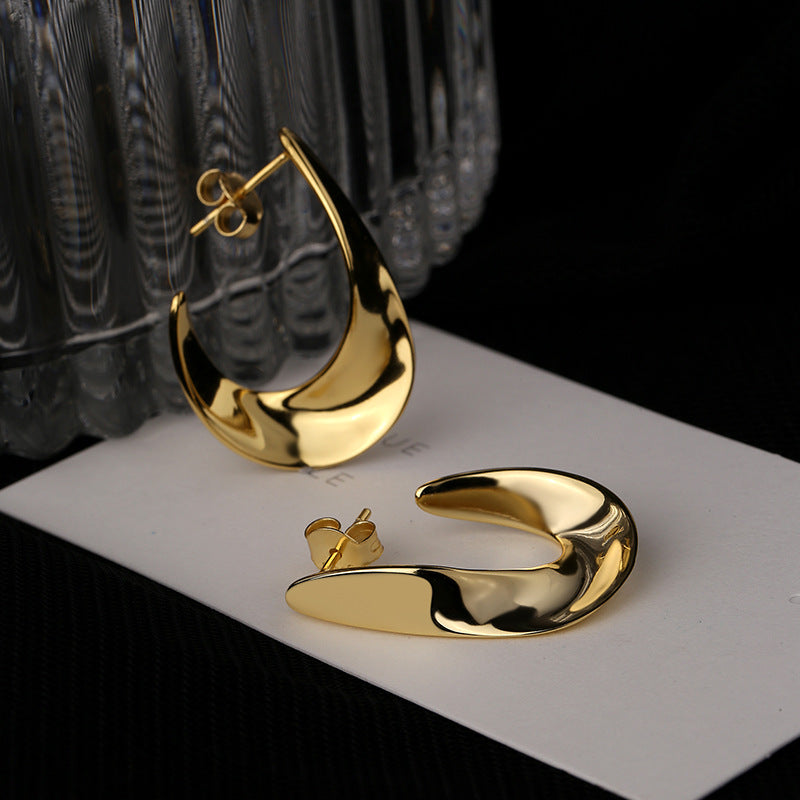 Damen Ohrringe mit elegantem, geschwungenem Design Shop Nory