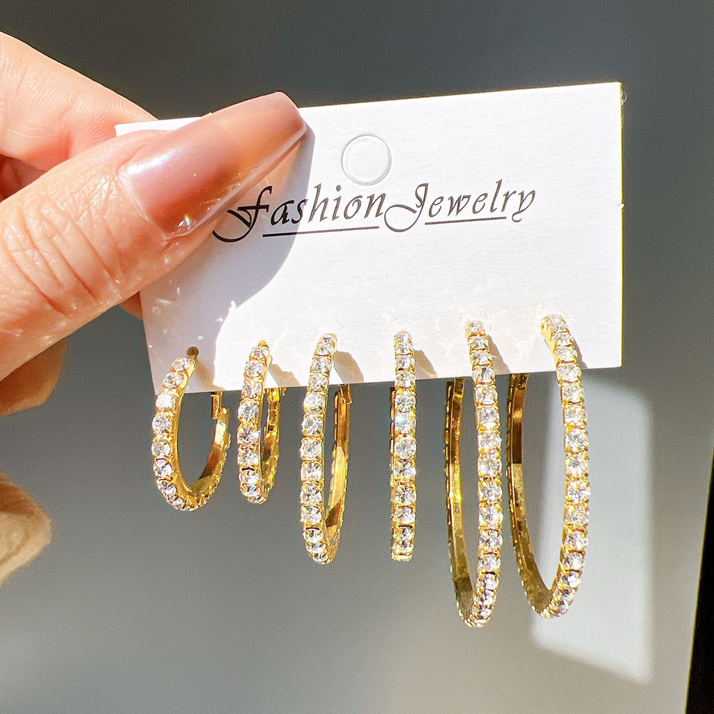 Damen Creolen mit funkelnden Zirkonia-Akzenten Shop Nory