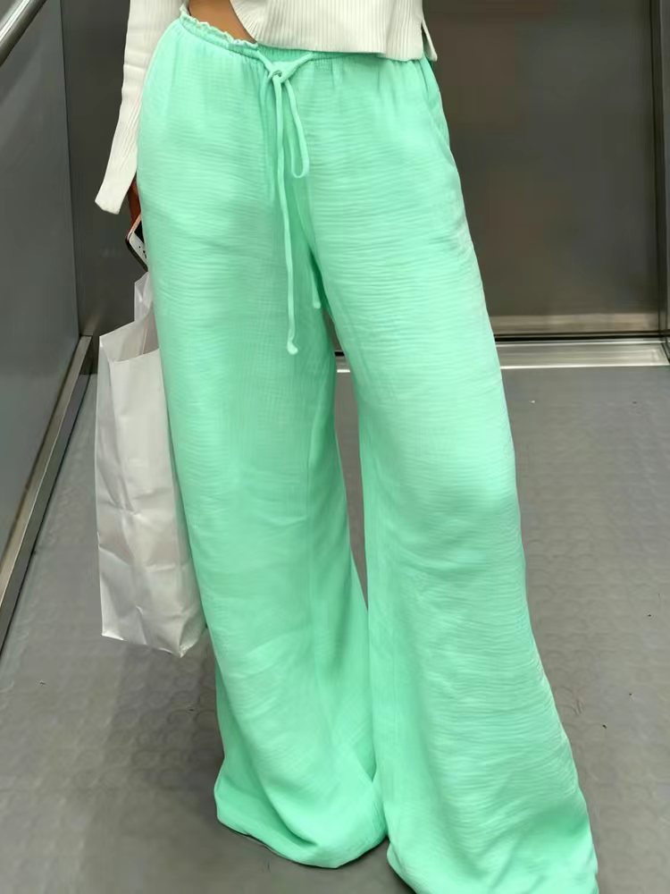 Damen Leinenhose mit lockerer, knöchellanger Passform, seitlichen Eingrifftaschen und Zierknopf-Details Shop Nory