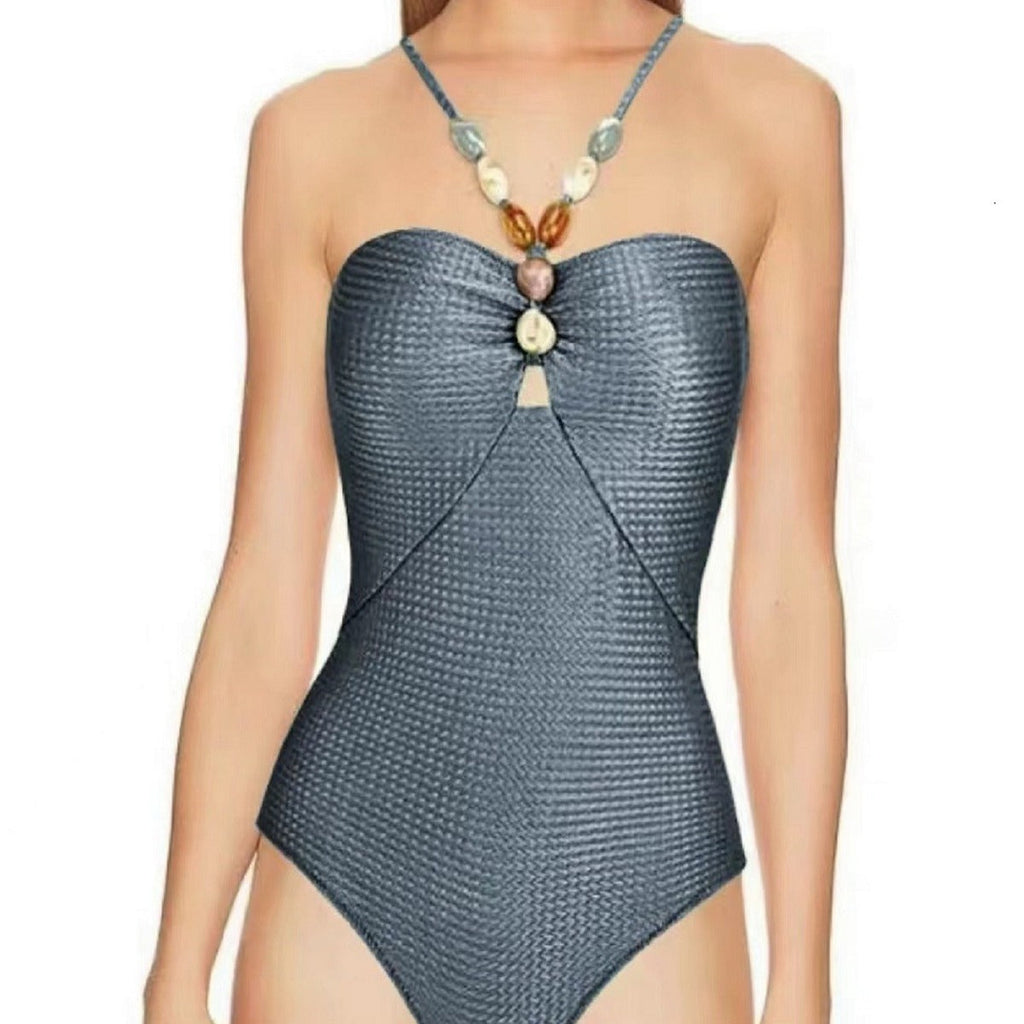 Damen Badeanzug mit elegantem Wickelrock und modischen Schmuckdetails