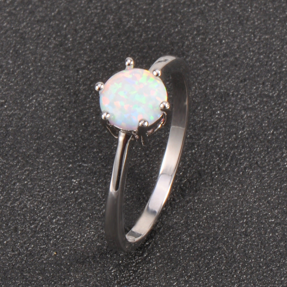 Damen Ring mit funkelndem Opal und eleganter Edelstahlfassung Shop Nory