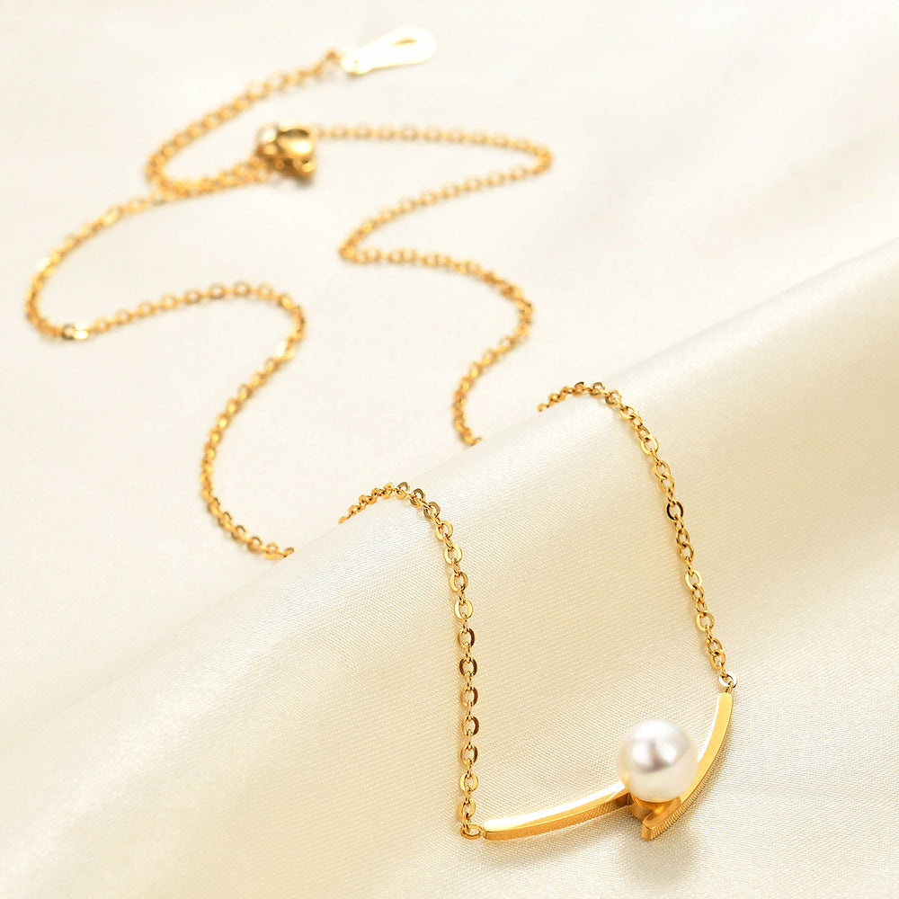 Damen Halskette mit elegantem Perlenanhänger und modernem Edelstahl-Design Shop Nory