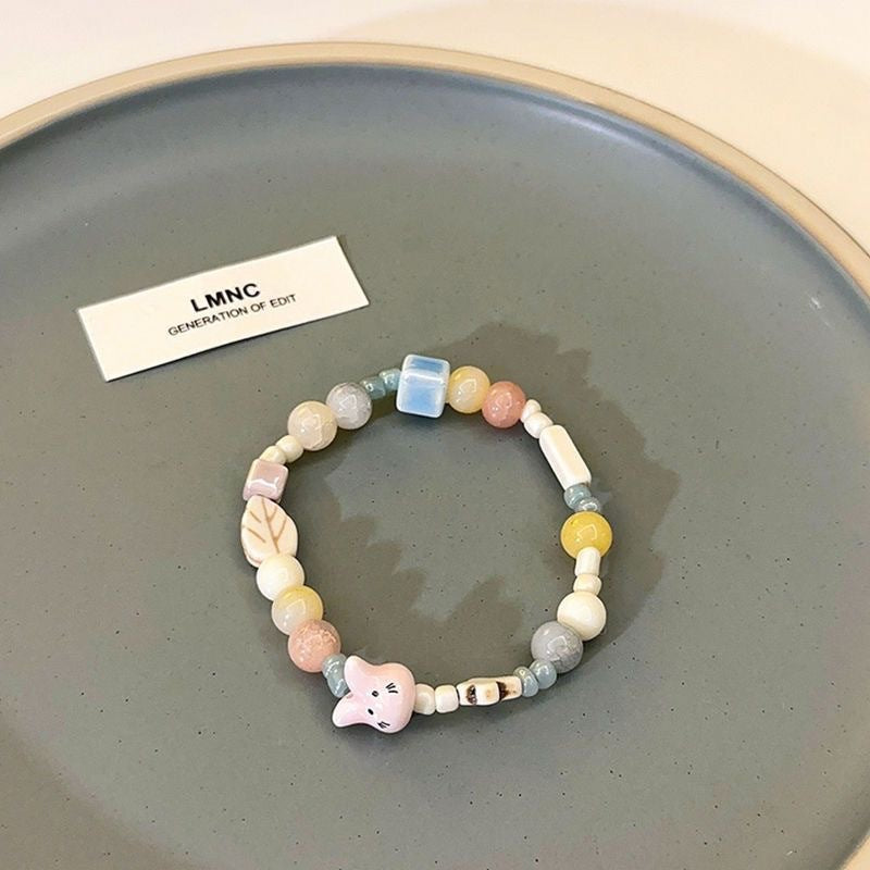 Damen handgemachtes Armband mit einzigartigen Tieranhängern Shop Nory