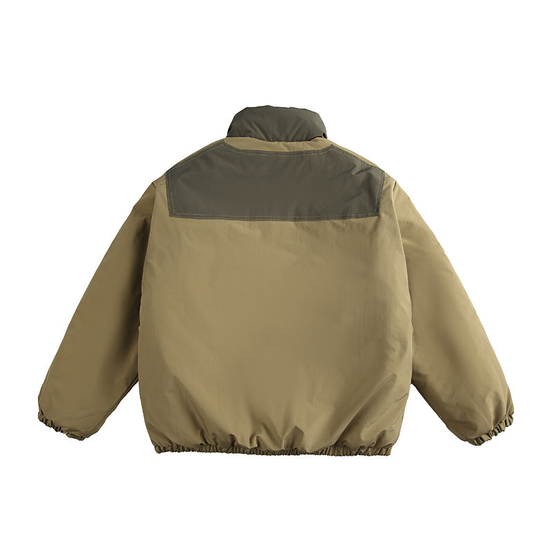 Unisex Boxy wattierte Stehkragenjacke mit Kontrastpaneelen, vertikalen Brustreißverschlüssen und großen Pattentaschen Shop Nory