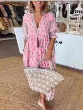 Frauen Boho Maxi Kleid aus leichtem Viskose-Mix mit V-Ausschnitt, Quastenbändchen, drei Viertelärmeln und seitlichen Taschen Shop Nory