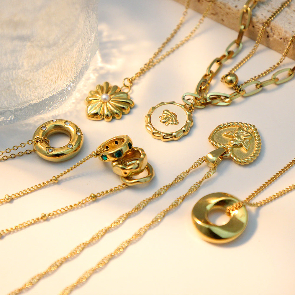 Damen elegante Halskette mit funkelndem Anhänger aus Edelstahl und goldplattierter Kette Shop Nory