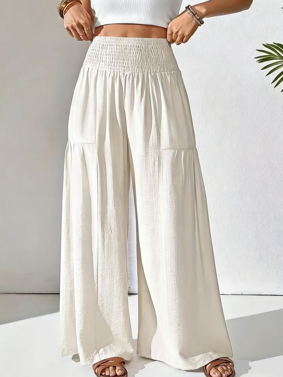 Damen weite Palazzo-Hose mit gerafftem Smock-Bund und Stufendetails Shop Nory
