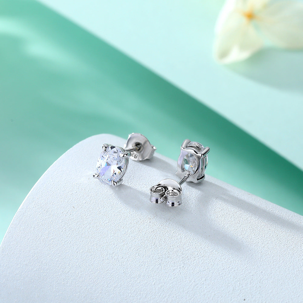 Damen Ohrstecker mit ovalem Zirkonia-Besatz und elegantem Edelstahlrahmen Shop Nory