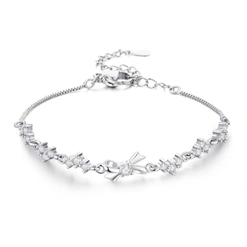 Damen zartes Armband mit funkelnden Zirkonia und filigranen Designelementen Shop Nory