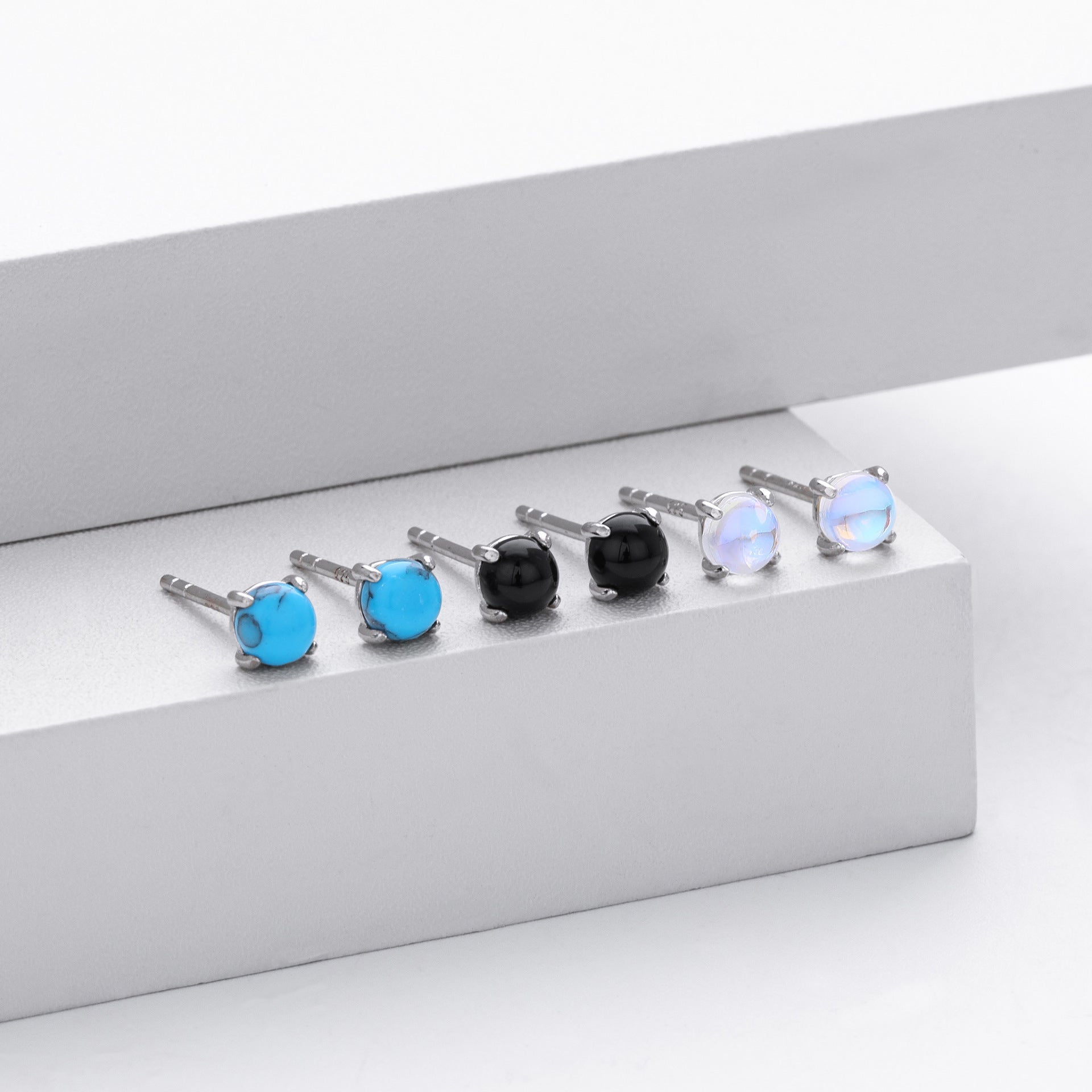 Damen Ohrstecker aus 925 Sterling Silber mit türkisfarbenem Zirkon Shop Nory