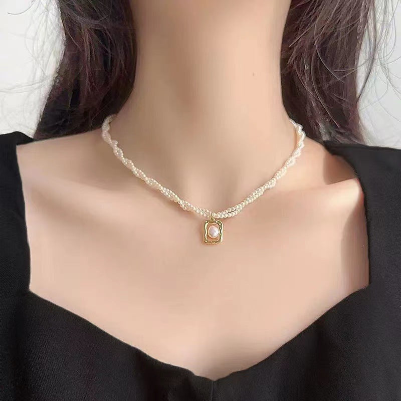 Damen Halskette mit exquisitem Perlenanhänger und filigraner Kettenstruktur Shop Nory