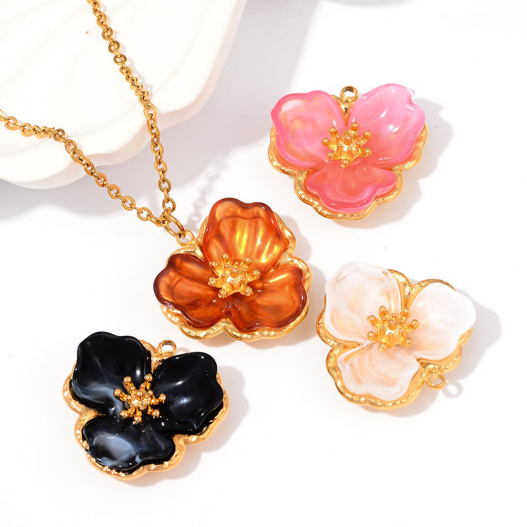 Damen Schmuckanhänger in Form einer filigranen Blüte mit goldener Akzentuierung Shop Nory