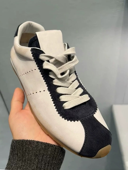 Damen Sneakers im eleganten Retro-Design mit atmungsaktiver Oberflächenstruktur