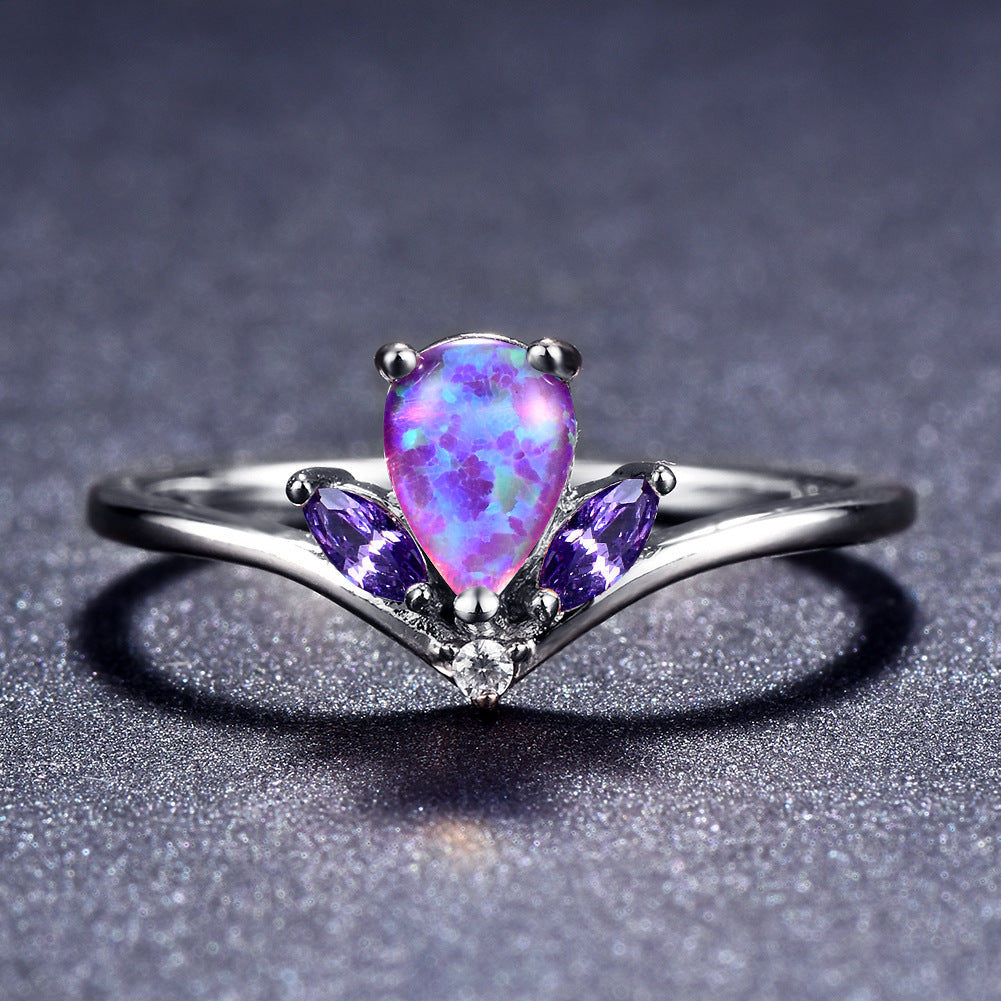 Damen Ring mit elegantem tropfenförmigem Opal und funkelnden Zirkonia Shop Nory