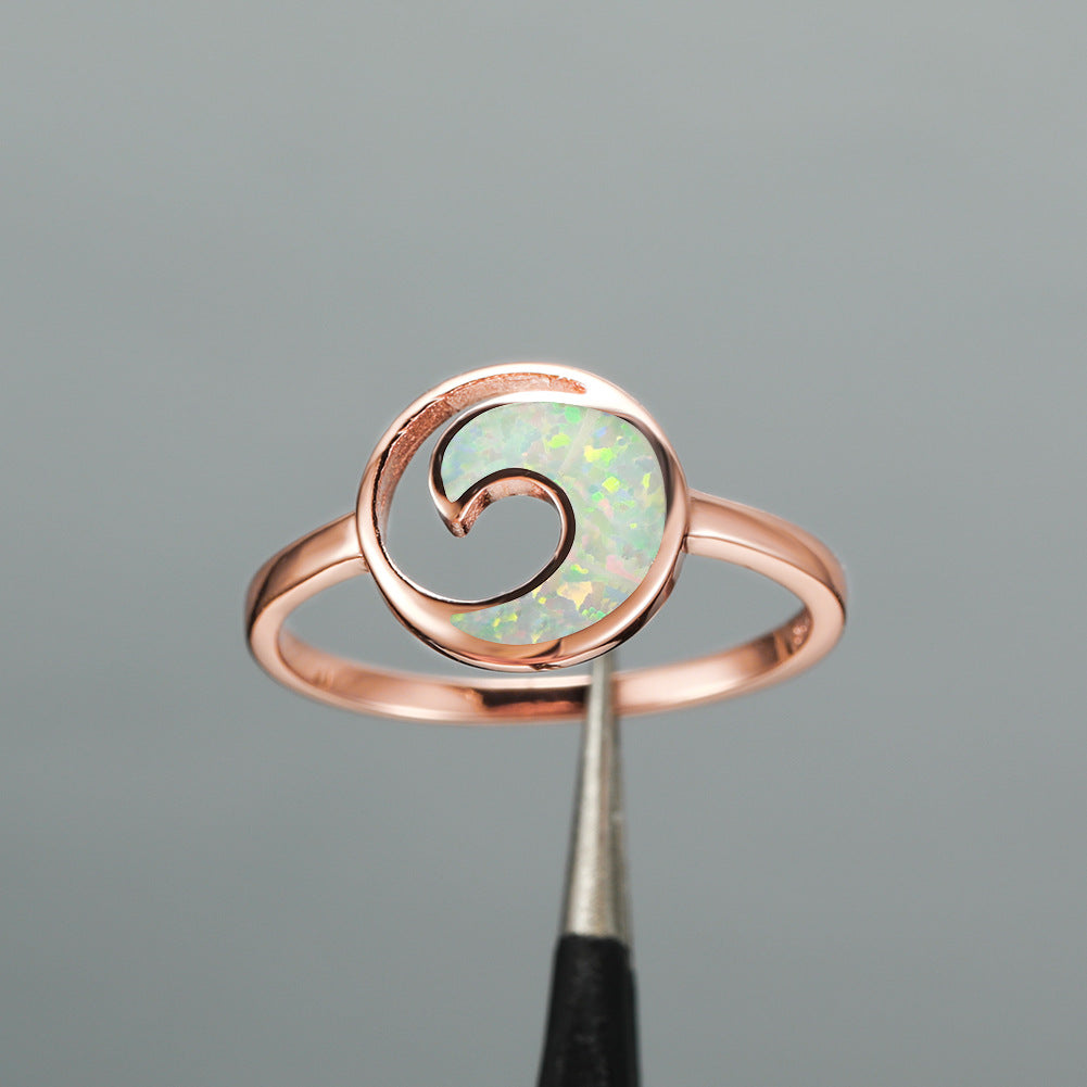 Damen Ring mit eleganter Spiralform und schimmerndem Opal Shop Nory