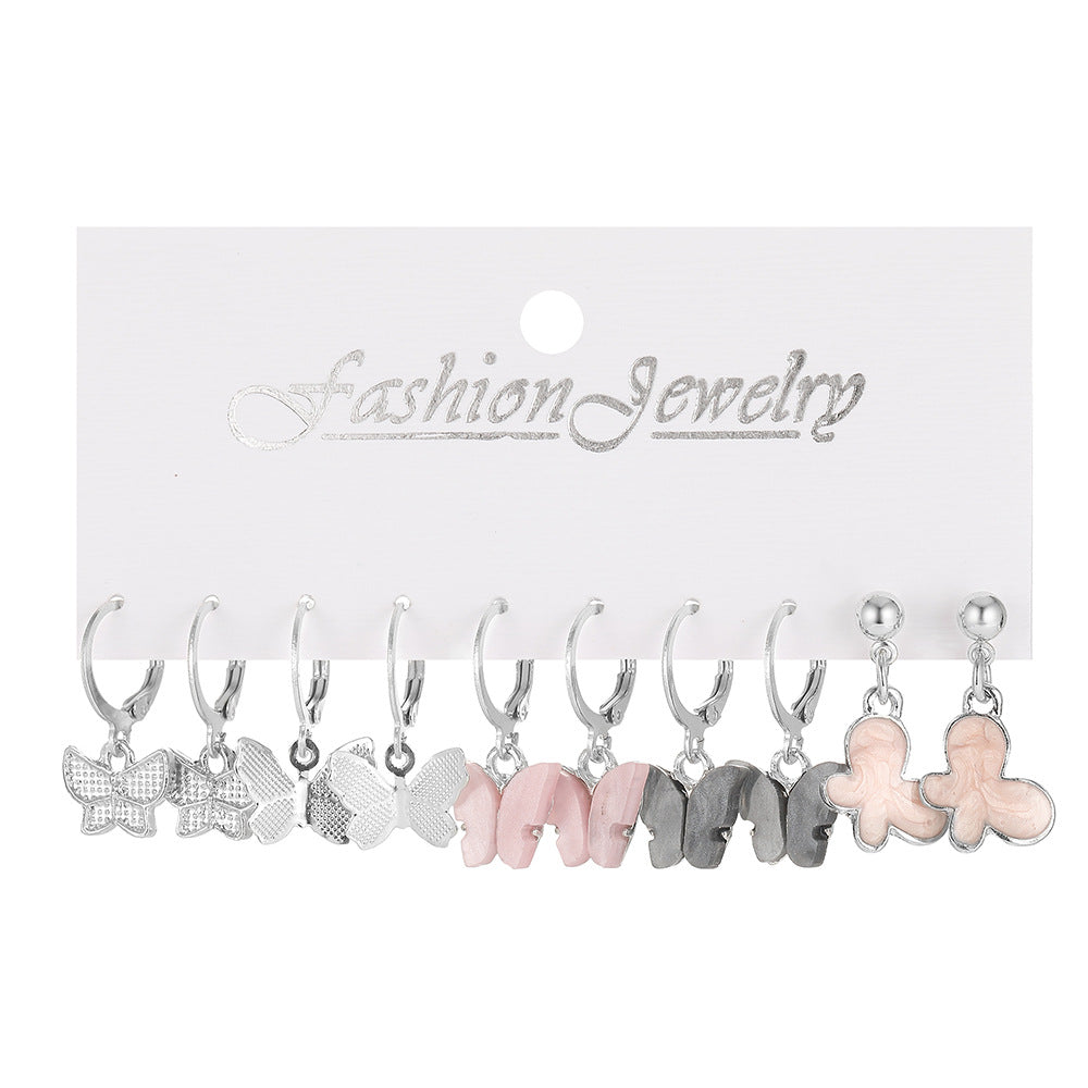 Damen Ohrschmuck Set mit verspielten Schmetterlingsanhängern Shop Nory