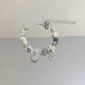 Damen Armband mit einzigartigen Charms und herzlichen Motiven Shop Nory