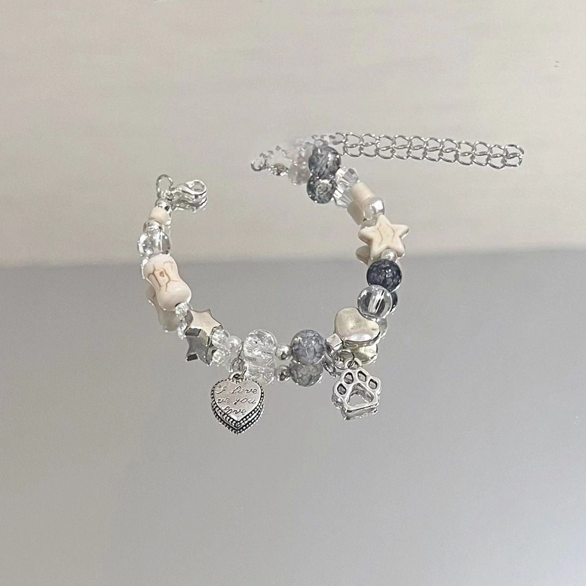 Damen Armband mit einzigartigen Charms und herzlichen Motiven Shop Nory