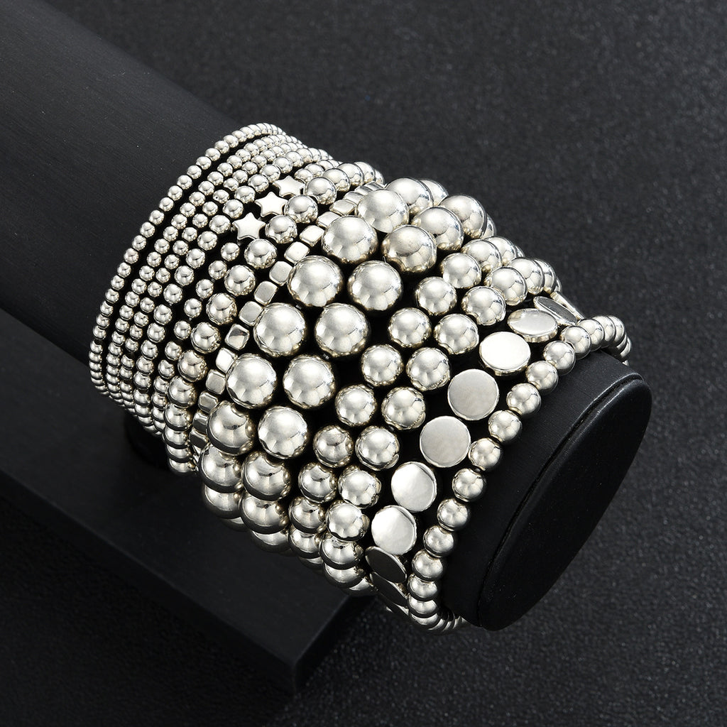 Damen Armreif-Set mit funkelnden metallischen Akzenten Shop Nory