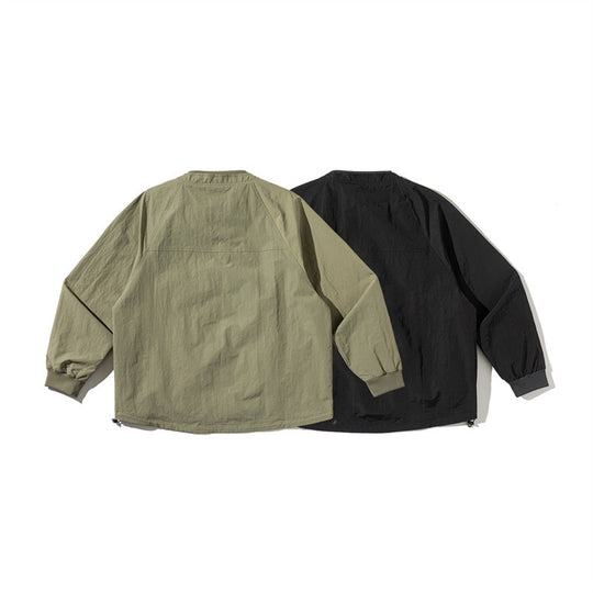Unisex Leichte Boxy-Fieldjacke ohne Kragen mit Raglanärmeln, aufgesetzten Klappentaschen und Kordelzug Shop Nory