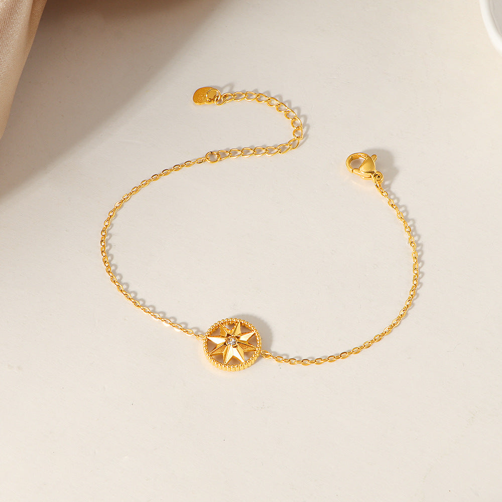 Frauen Kompass-inspirierte Charm-Armbanduhr Shop Nory
