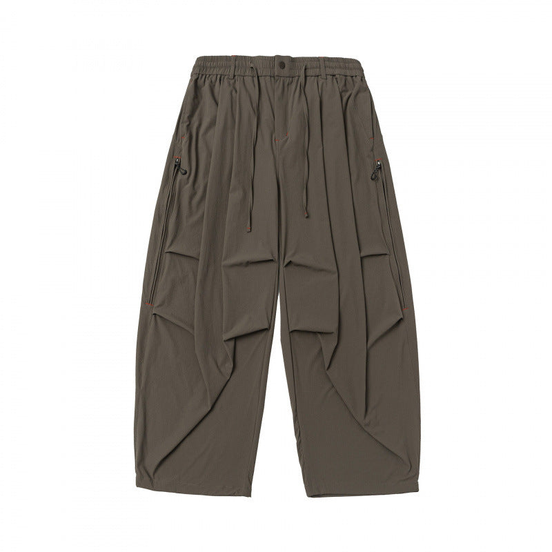 Unisex Weitgeschnittene technische Cargo-Hose mit Gummibund, Kordelzug und Reißverschlusstaschen Shop Nory