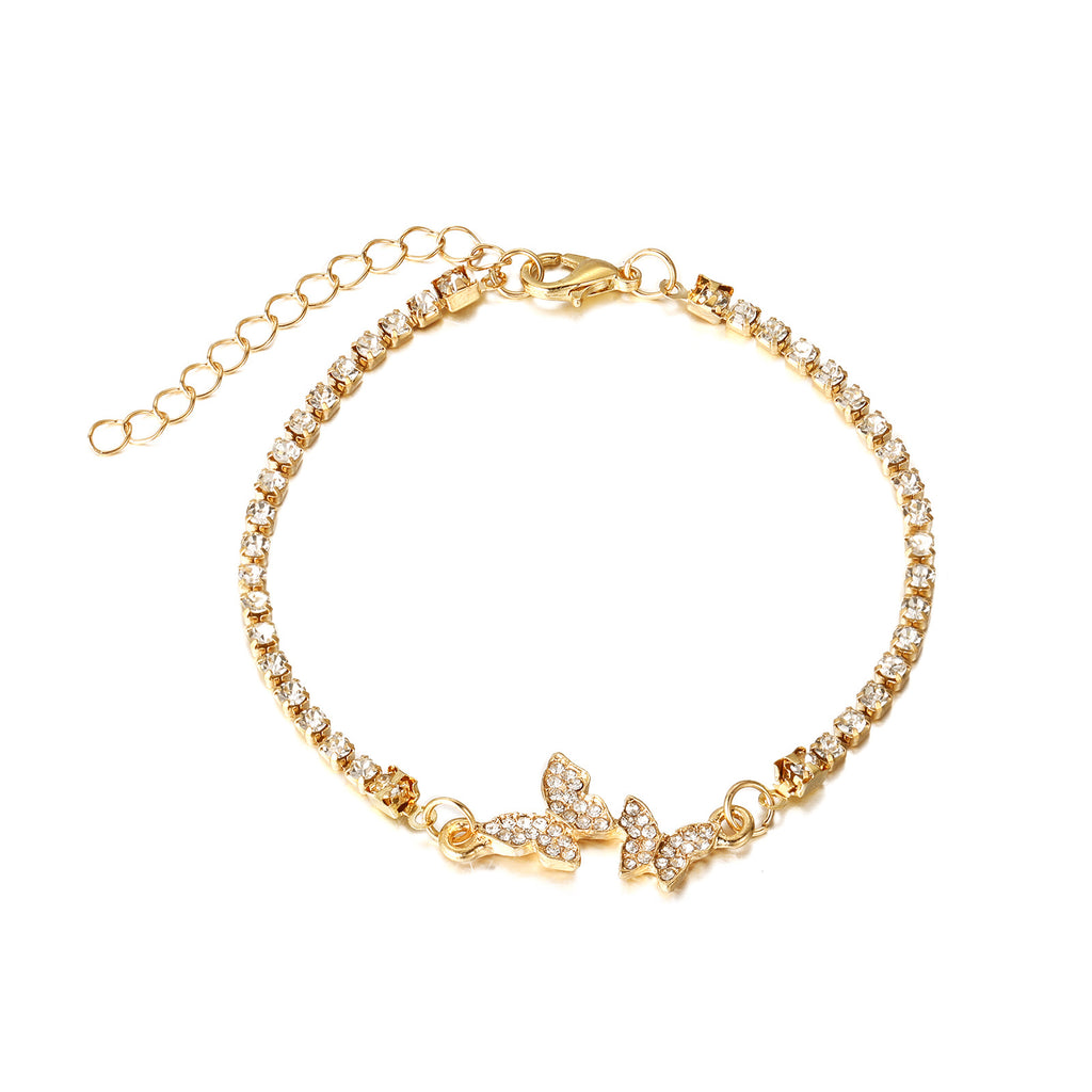 Damenarmband mit funkelnden Schmetterlingsanhängern Shop Nory
