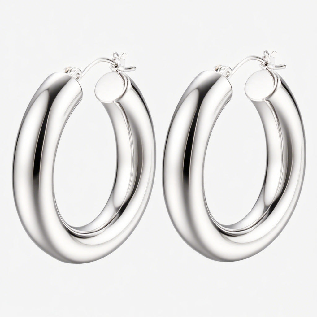 Damen goldene Ohrstecker im eleganten geschwungenen Design Shop Nory