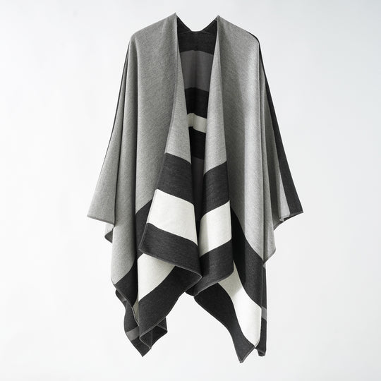 Damen Oversize-Ruana im Cape‑Stil aus Wolloptik mit geometrischen Blockstreifen Shop Nory