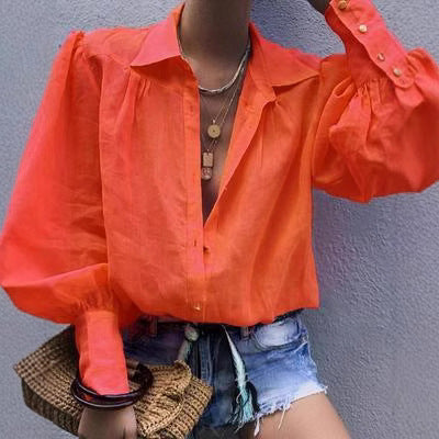 Damen Bluse mit voluminösen Ärmeln und elegantem Kragen