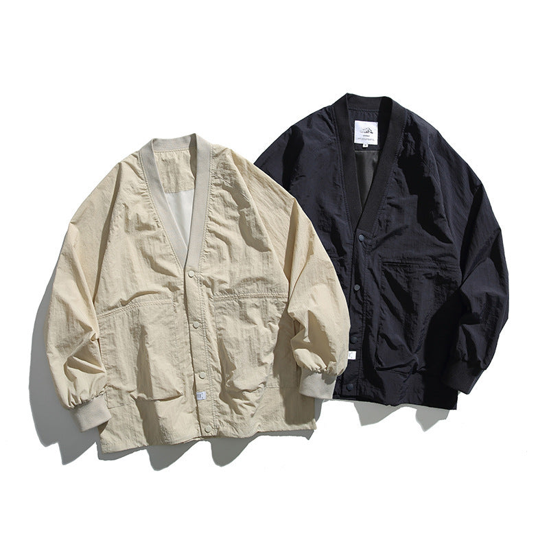 Unisex Weitgeschnittene Leichte Übergangsjacke mit V-Ausschnitt und Druckknopfleiste Shop Nory