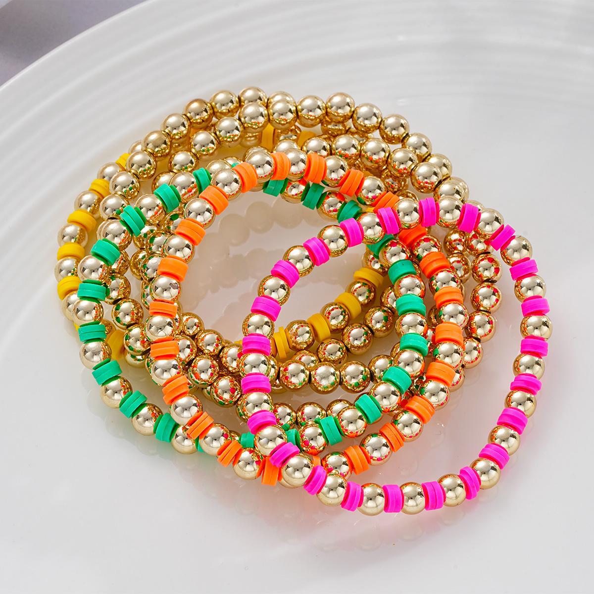 Damen Armband-Set mit bunten Perlen und glänzenden Metallakzenten Shop Nory