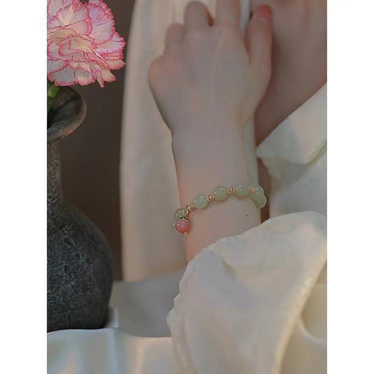 Damenarmband mit handgefertigten Jade- und Achat-Elementen sowie charmantem Obstanhänger Shop Nory