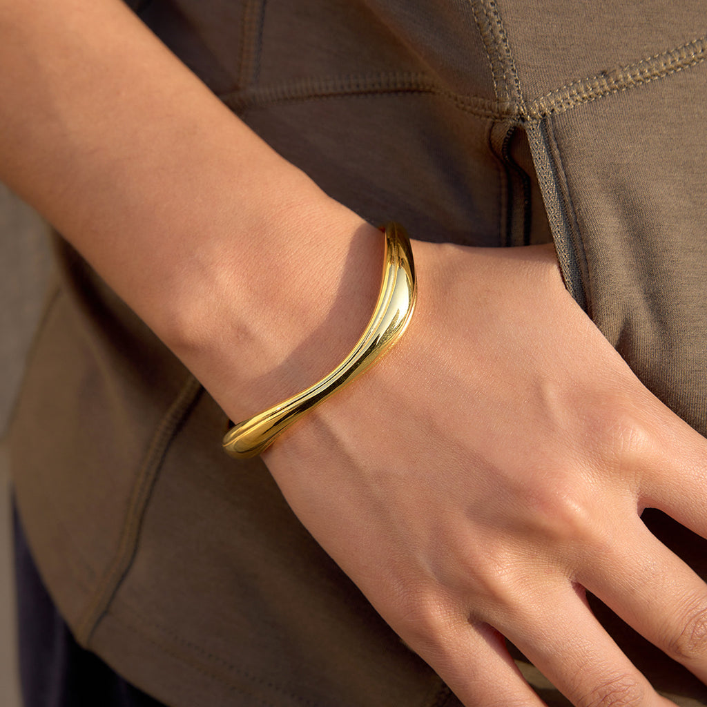 Damen Armband mit glänzenden ovalen Metallabschlüssen und verstellbarem Verschluss Shop Nory