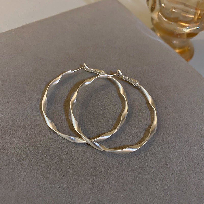 Damen Ohrstecker im modernen Wellen-Design Shop Nory