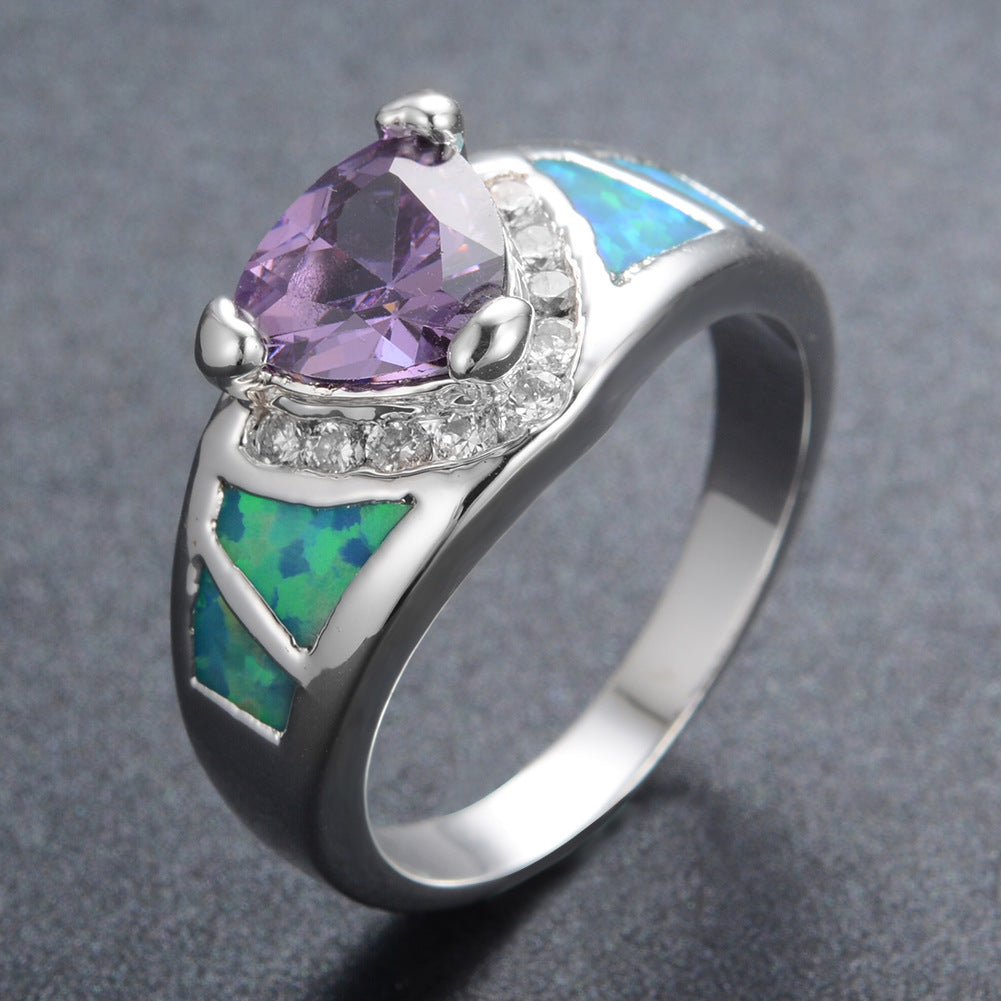 Damen Ring mit facettiertem Amethyst und opalisierenden Elementen Shop Nory